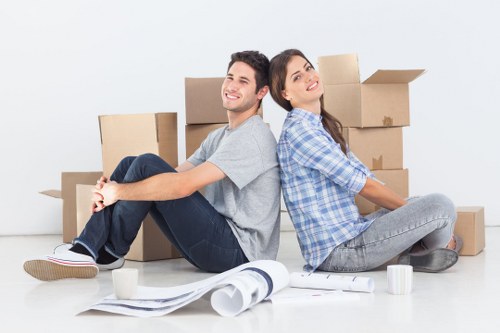 Professional movers handling a flat move with careful packing and transport